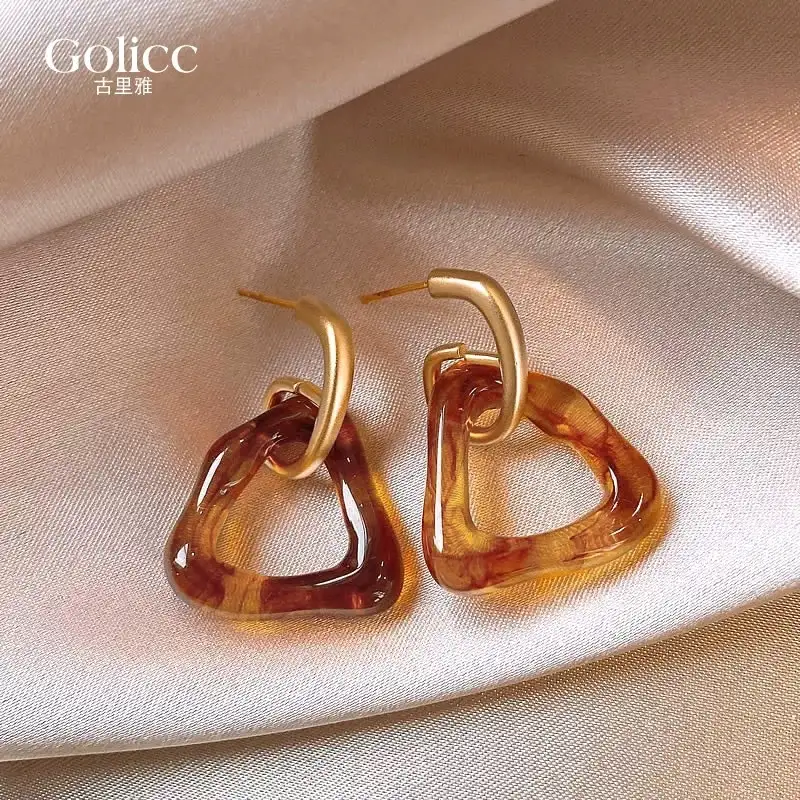 Boucles acier inoxydable avec pendentif en résine